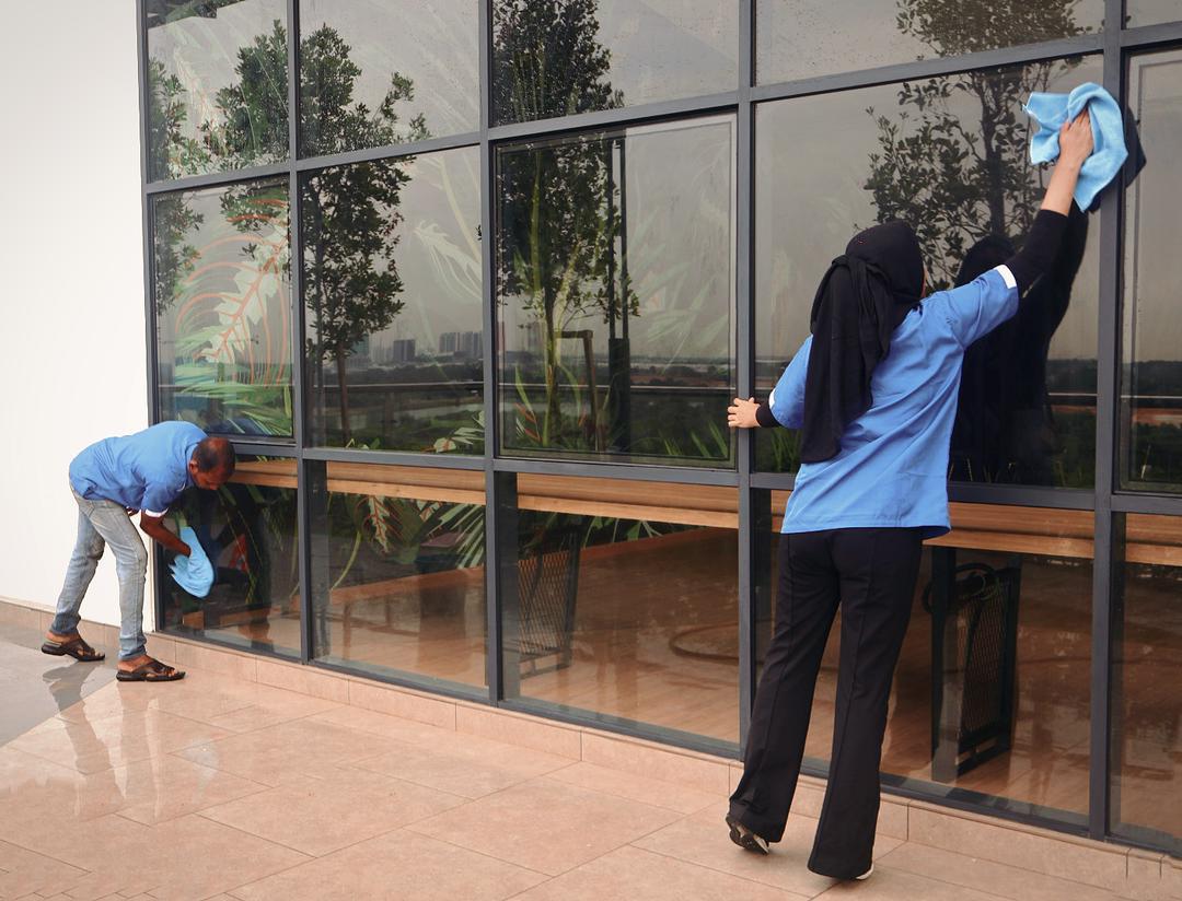 CSC Services crew cleaning a glass frontage